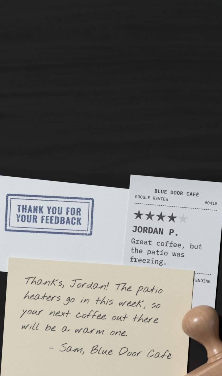 Jordan’s 4-star review ticket, “Great coffee, but the patio was freezing,” on a desk beside a card stamped “Thank you for your feedback” and a rubber stamp, with a handwritten reply on top: “Thanks, Jordan! The patio heaters go in this week, so your next coffee out there will be a warm one. – Sam, Blue Door Café”